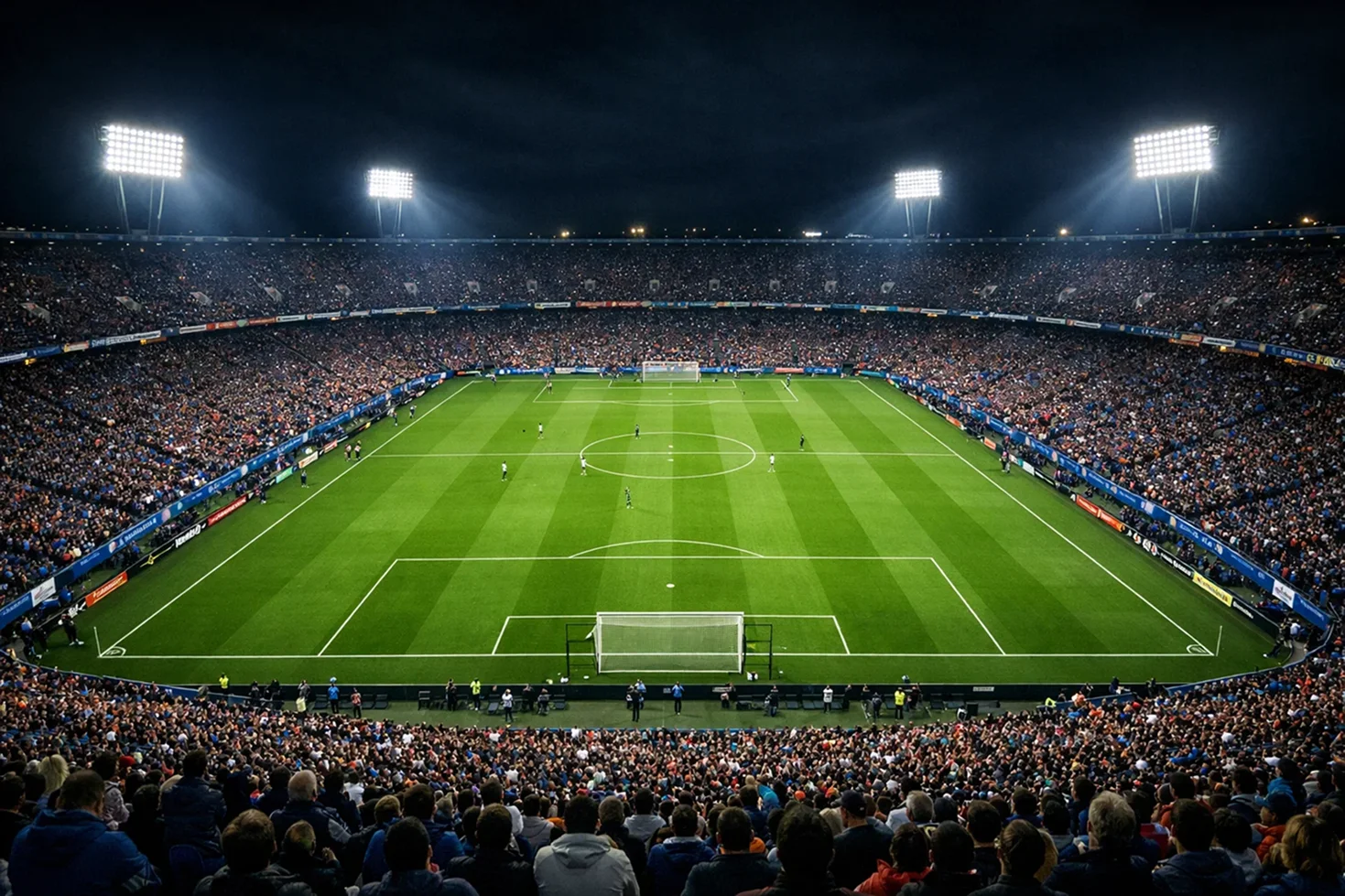 Verschiedene europäische Fußballstadien bei Flutlicht